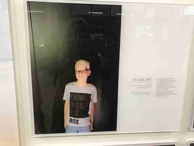 Photo of a photo of a boy.