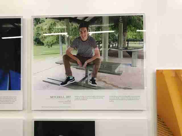 Photo of a photo of a young man.