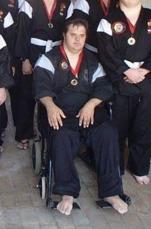 A man sitting in a wheelchair
