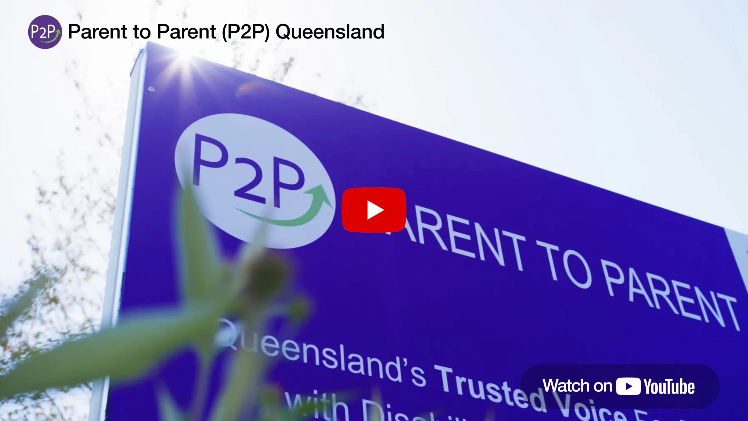 Outdoor sign with P2P parent to parent on purple background