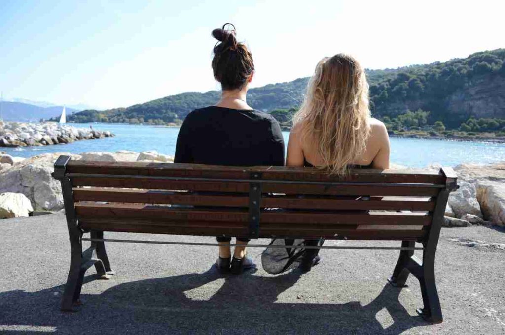 Photo of two women on a bench