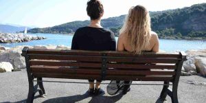 Photo of two women on a bench
