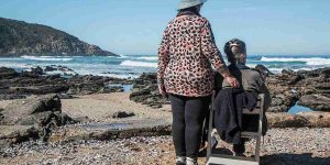 women looking at the ocean