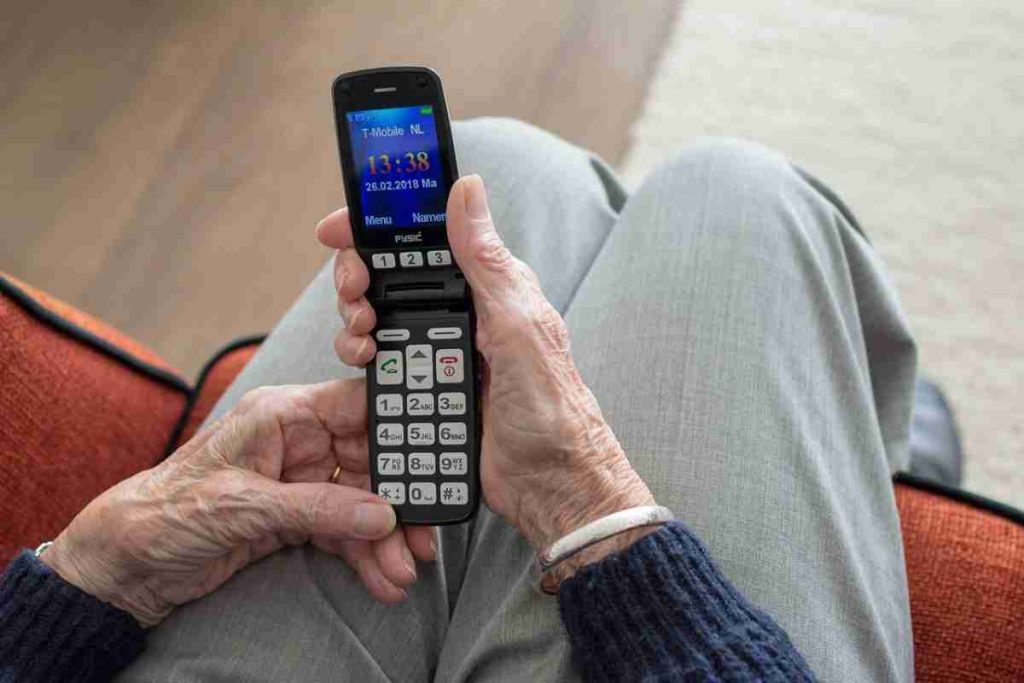 Woman's hands holding mobile phone