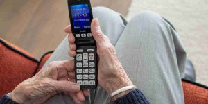 Woman's hands holding mobile phone