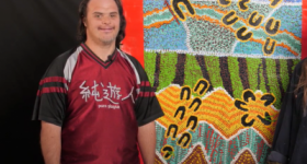 Jiha with his artwork
